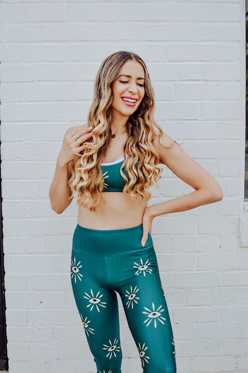activewear brands you should be wearing, Smiling because she knows The Activewear Brands You Should Be Wearing Now